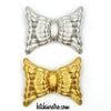 Monet Modern Bow Brooch Set at bitchinretro.com