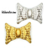 Monet Modern Bow Brooch Set at bitchinretro.com