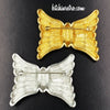 Monet Modern Bow Brooch Set at bitchinretro.com