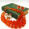 West Germany Orange Beaded Necklace With Enameled Brooch and Sarah Coventry Earrings at bitchinretro.com