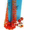 West Germany Orange Beaded Necklace With Enameled Brooch and Sarah Coventry Earrings at bitchinretro.com