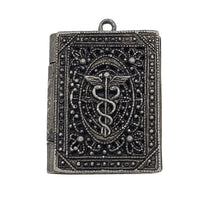 Antique Nurses Locket Pendant With Caduceus Symbol at bitchinretro.com