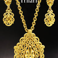 Vintage Crown Trifari Necklace and Earring Set at bitchinretro.com