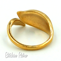 1979 Avon Leaf Glow Bypass Ring With Elfish Fairy Style at bitchinretro.com