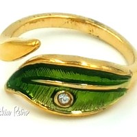 1979 Avon Leaf Glow Bypass Ring With Elfish Fairy Style at bitchinretro.com