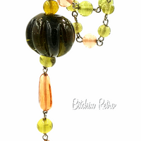 Pumpkin or acorn squash art glass necklace at bitchinretro.com